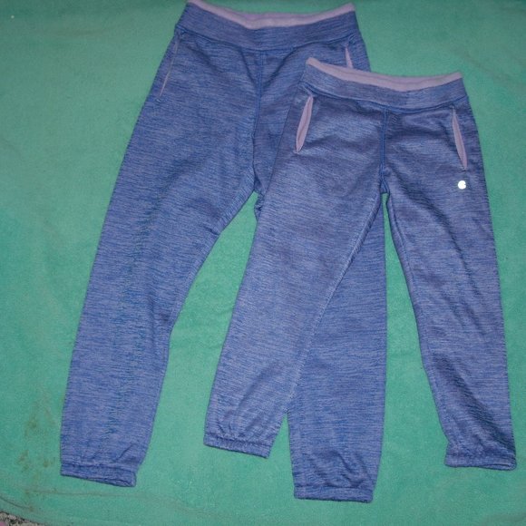 2 pairs of purple joggers one is 7-8 and 4-5 - Picture 1 of 4
